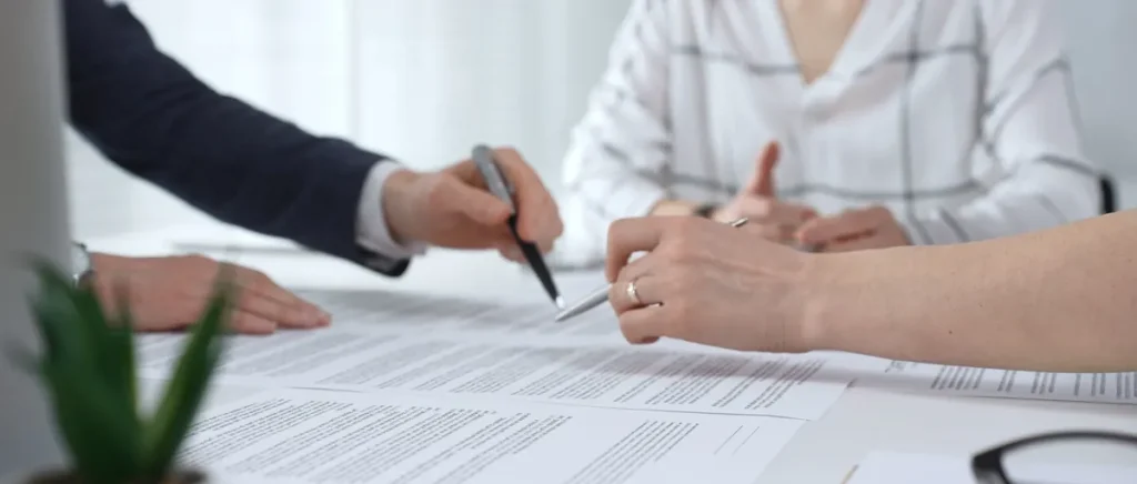 Doctor reviewing insurance claim documents with a patient